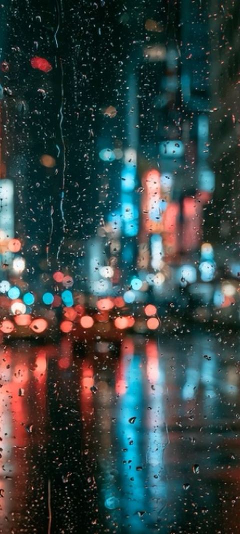 Rainy City Lights live wallpaper by ScreenLux playing on a phone